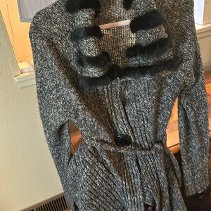 Talie Wool blend speckled asymmetrical sweater with fur trim at the collar